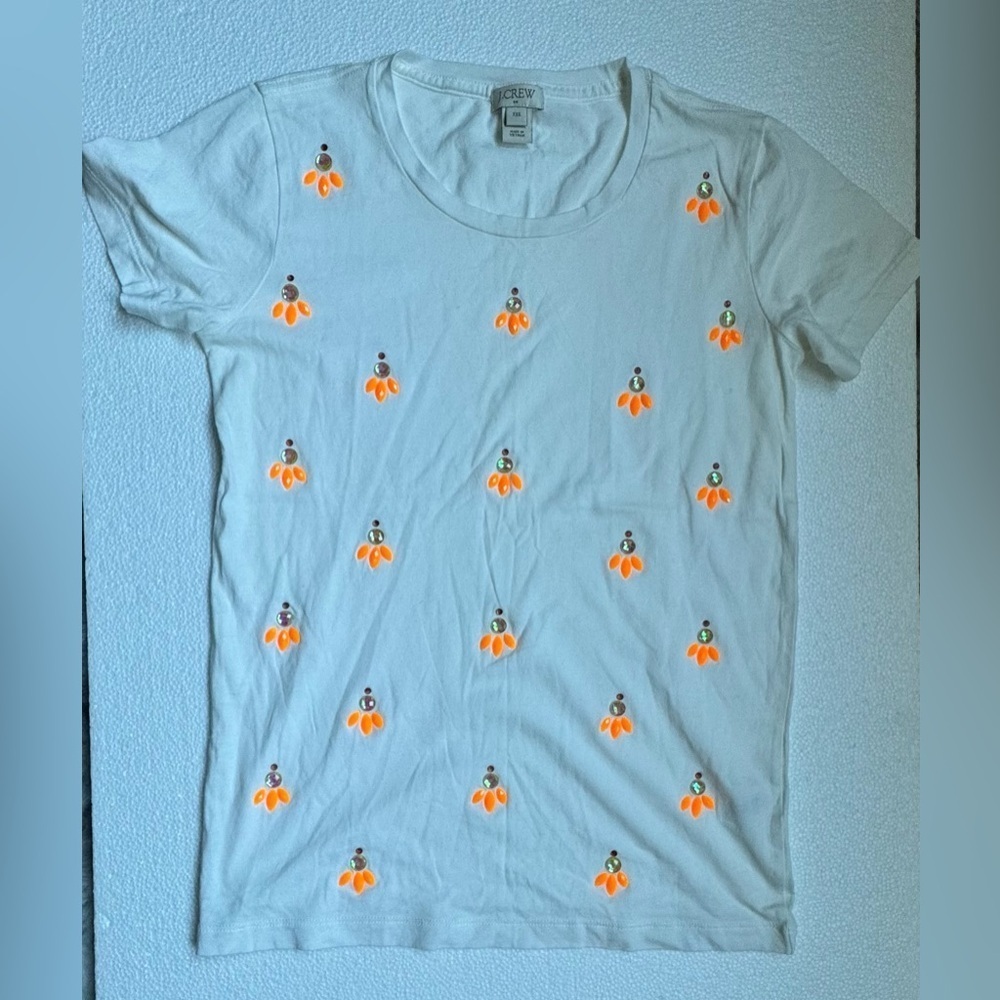 J. Crew White Tee with Orange Floral Design jewel/gem decoration.
